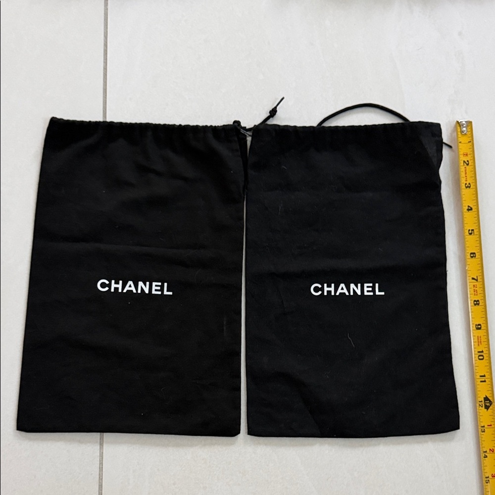 CHANEL Black Drawstring Bags with Logo